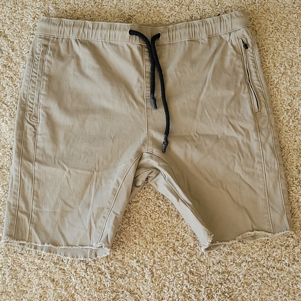 Medium, slim-fit, stretch-fit khaki cutoffs